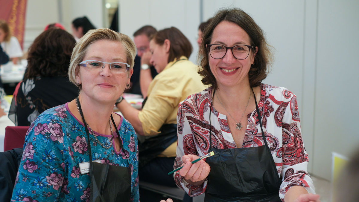 Zwei Führungskräfte auf dem Führungsforum 2025